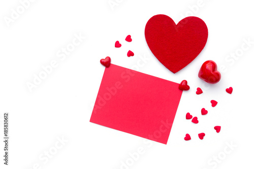 Valentines day background with empty blank and red heart. Top view with copy space