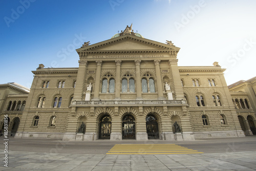 Bern, Switzerland - October 30, 2017: The Federal Palace, which is the seat of Federal Parliament (Swiss Federal Assembly), is located in a large building which dominates this part of the city.
