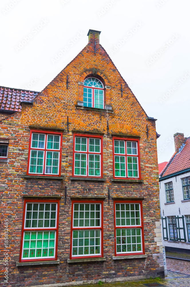The evening shot of historic medieval building in Bruges, Belgium