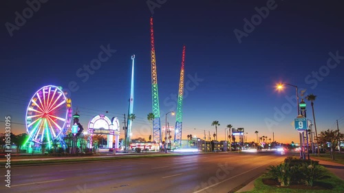 Orlando Florida Kissimmee Amusement Park Attractions Timelapse with Driving Traffic on Irlo Bronson Memorial Highway FL 192 at Dusk