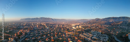 Panorama of Terni, Umbria, Italy. Christmas day, smoke over city, sunset light. Shutted from the drone, 120 m.