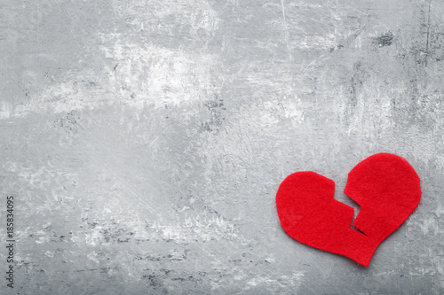 Принти на полотні Broken red heart on grey wooden table
