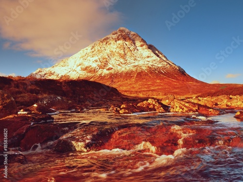 Sunny winter morning at frozen river Coupall at delta to river Etive. Higland in Scotland an marvelous day.