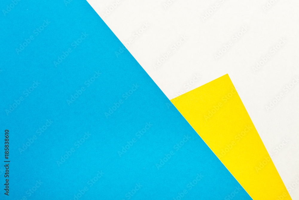 Bright blue and yellow color paper texture background. Trend colors, geometric paper background. Colorful of soft paper background. Bright blue and yellow color paper texture background. Trend colors, geometric paper background. Colorful of soft paper background.