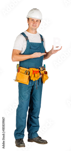 Full length portrait of a male builder in with helmet over white wall background. repair, construction, building, people and maintenance concept.