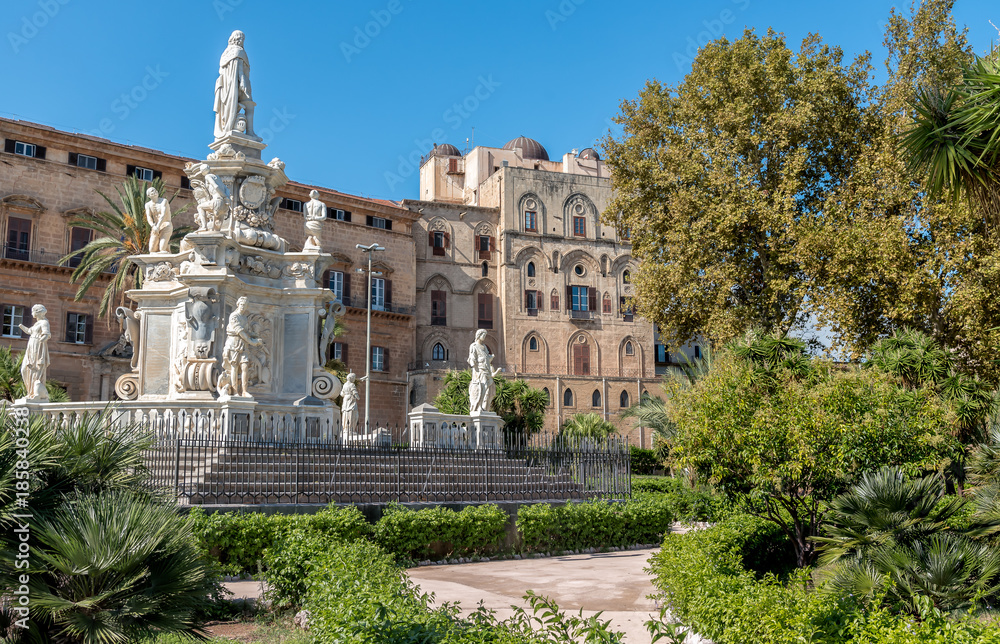 View of Monument to King Philip V of Spain in the Villa Bonanno and Norman Palace in background, Palermo, Italy