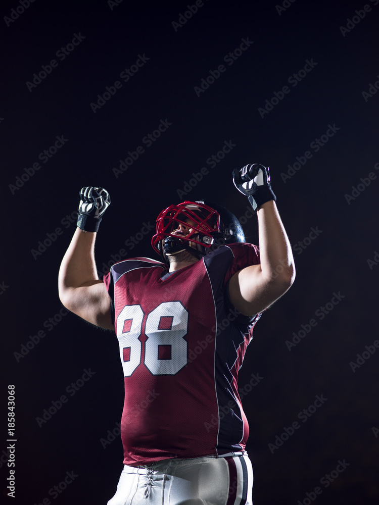 american football player celebrating after scoring a touchdown american football player celebrating after scoring a touchdown