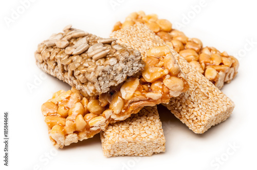 A set of different gozinaki dessert bars isolated on white background