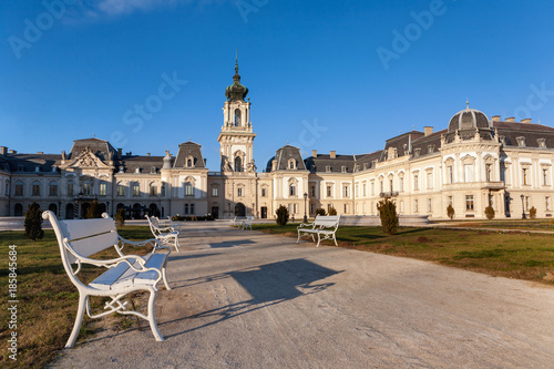 The Festetics baroque castle with white benches in the front near to Lake Balaton and Heviz in Hungary photo