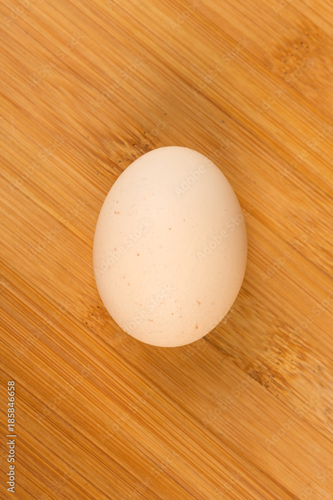 Farm fresh eggs on a wood background Farm fresh eggs on a wood background