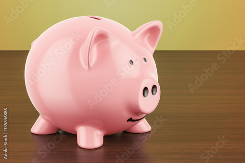 Piggy bank on the wooden table, 3D rendering