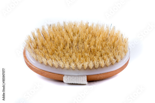 Dry body brush on a white background