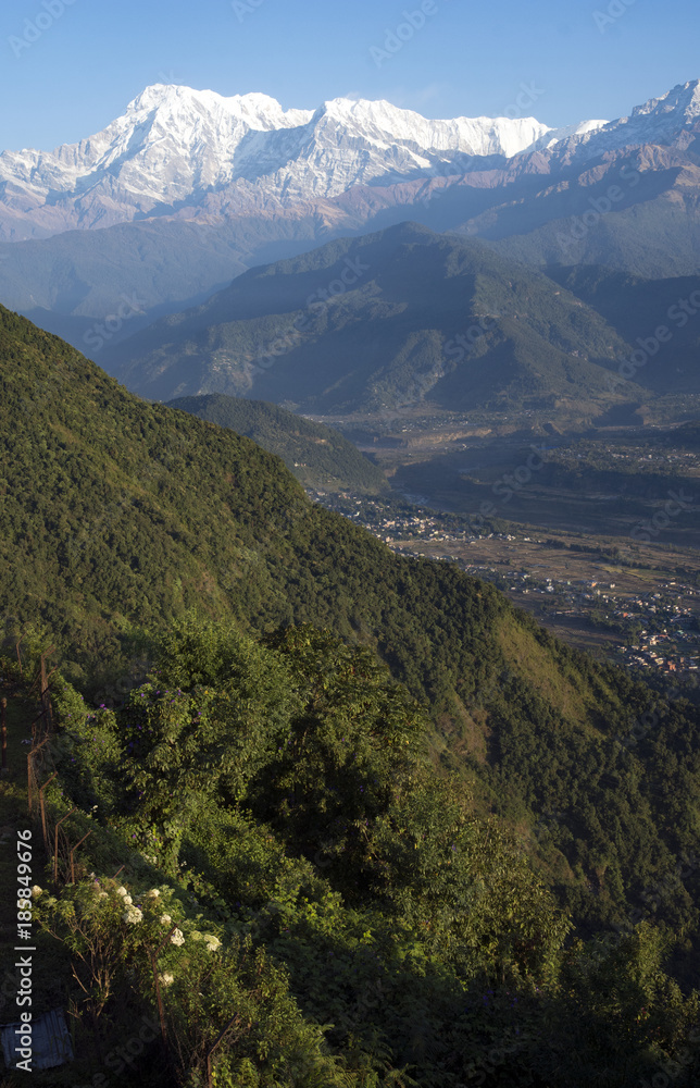 The Himalayas seen from Sarangkot mountain. The Annapurna range is at left. City of Pokhara lies in the valley below.