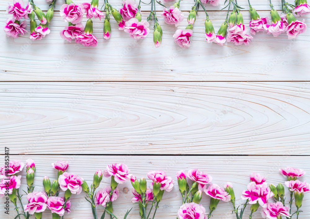 pink spring flower on wooden background