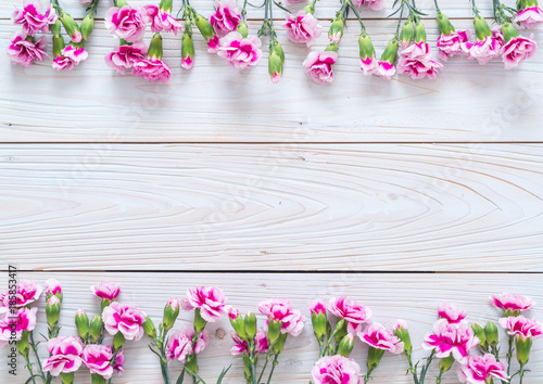 Fototapeta Naklejka Na Ścianę i Meble -  pink spring flower on wooden background