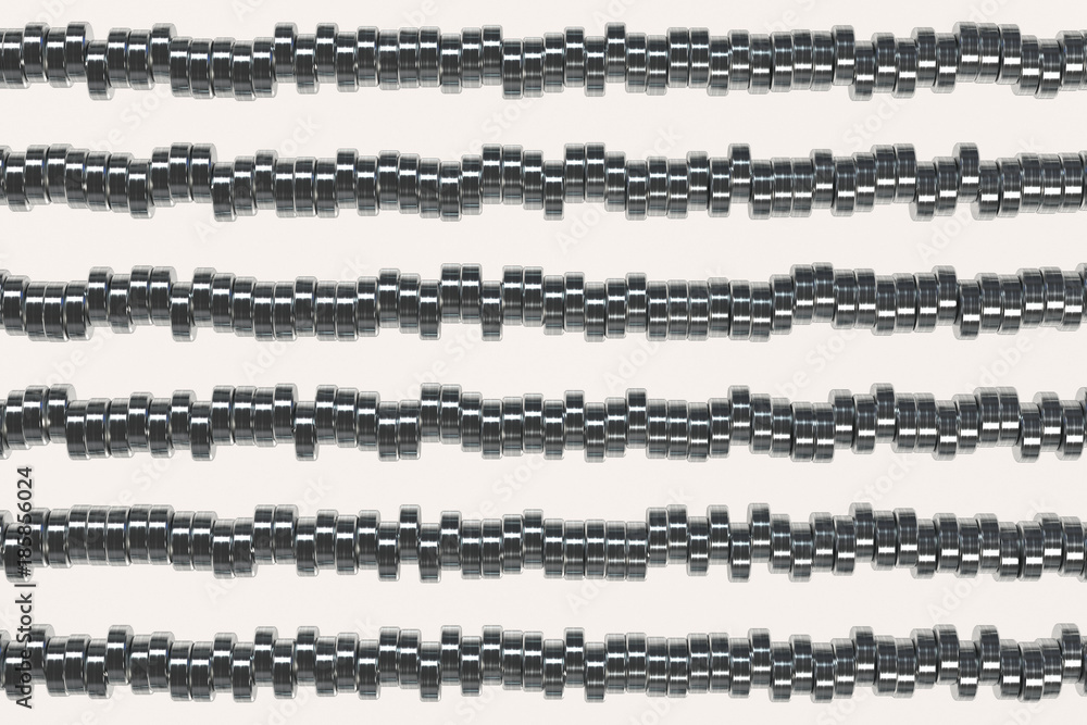 Pattern of brushed metal cylinder tablets on white background Pattern of brushed metal cylinder tablets on white background