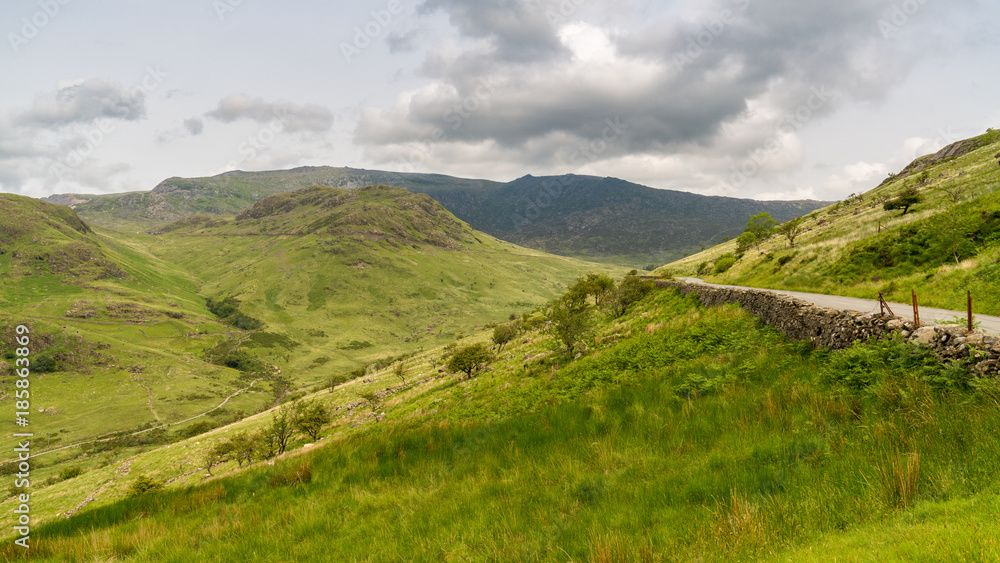 Obraz premium Snowdonia Landscape on the road between Capel Curig and Beddgelert, with the valley of the River Glaslyn, Gwynedd, Wales, UK