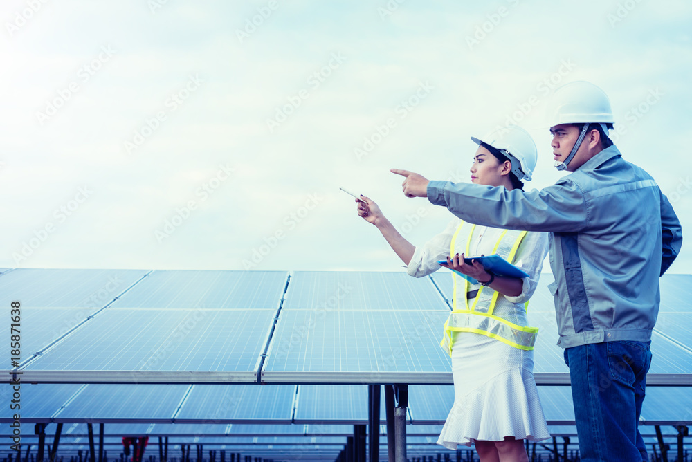 engineer checking job routine of labor working on cleaning solar panel at outside ; operation working on preventive and maintenance in solar power plant for great efficiency. engineer checking job routine of labor working on cleaning solar panel at outside ; operation working on preventive and maintenance in solar power plant for great efficiency.