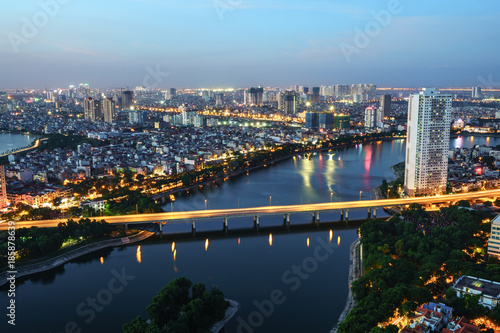 Aerial skyline view of Hanoi cityscape at twilight. Linh Dam peninsula, Hoang Mai district, Hanoi, Vietnam