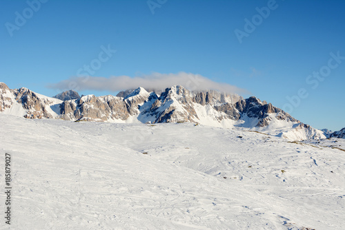 Almost empty ski slopes in Dolomites, Italy, Europe.