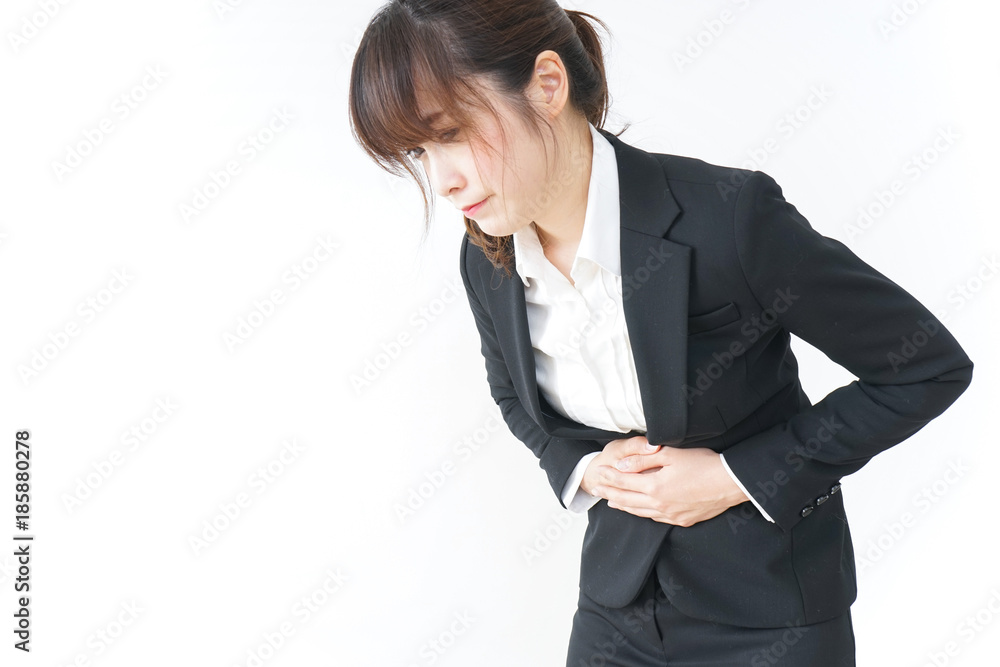 businesswoman suffering from stomachache businesswoman suffering from stomachache