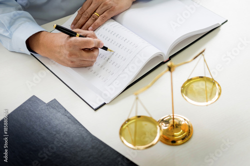 gavel and soundblock of justice law and lawyer working on wooden desk background.