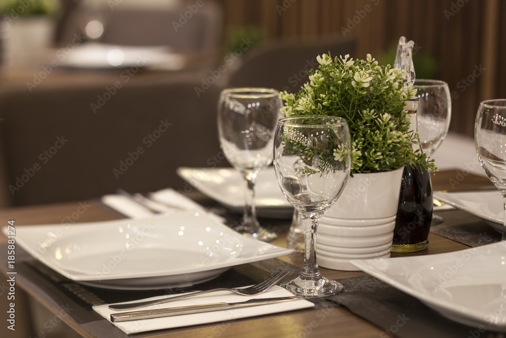 seting for dinner at a restaurant with square plates