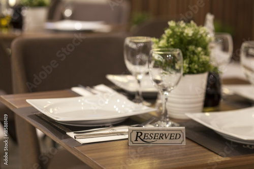 reservation on a dinner table at the restaurant photo