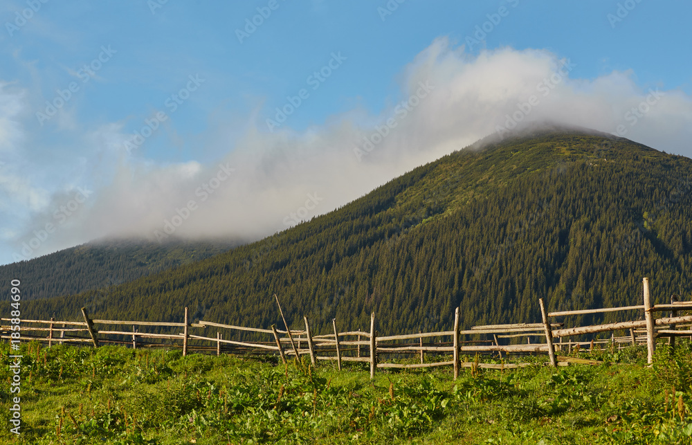 Fototapeta premium Misty dawn in the mountains
