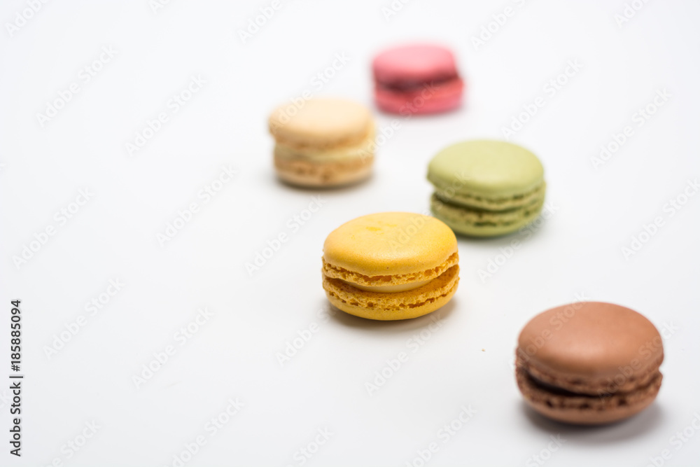 several small macarons of different flavors several small macarons of different flavors