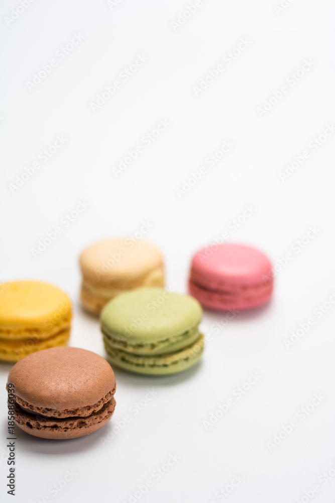 several small macarons of different flavors several small macarons of different flavors