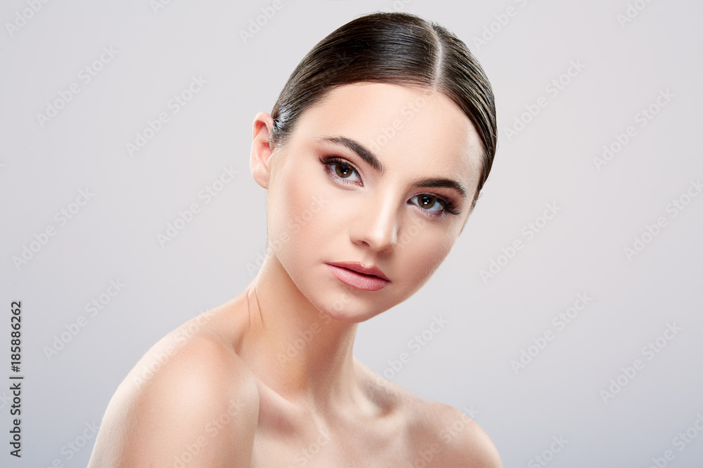 Beautiful girl with nude make up at studio Beautiful girl with nude make up at studio