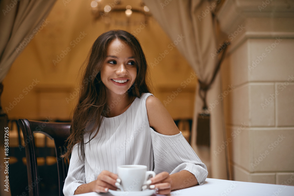 Woman In Cafe. Beautiful Female With Coffee In Restaurant. Woman In Cafe. Beautiful Female With Coffee In Restaurant.