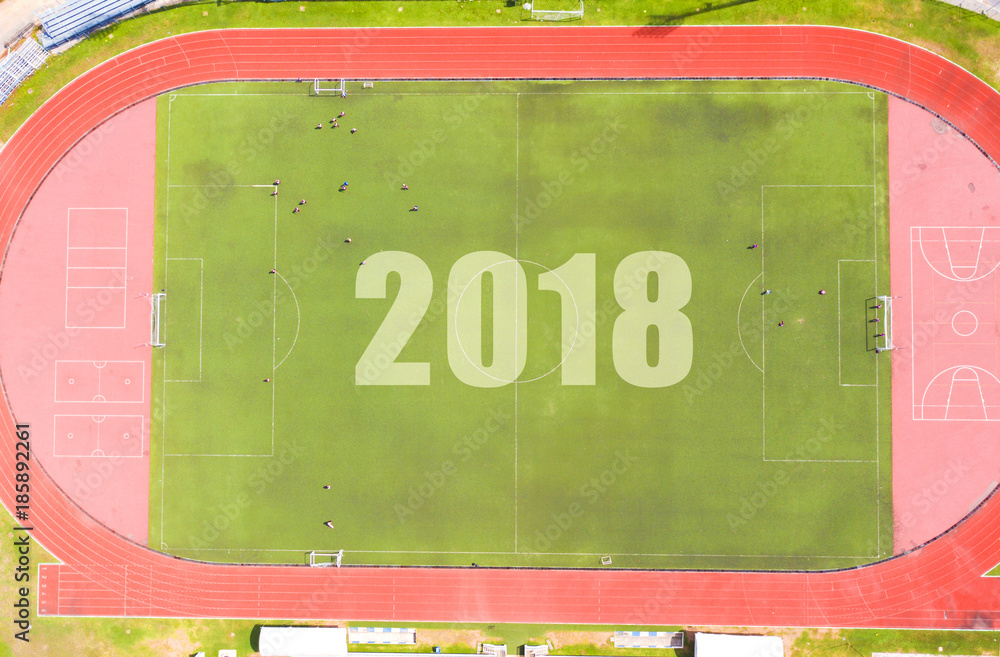 Obraz premium 2018 on football grass field background