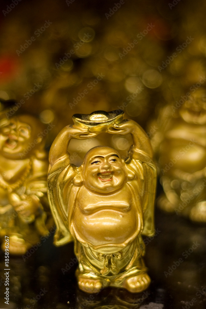 Obraz premium Buddha gold happy figurines
