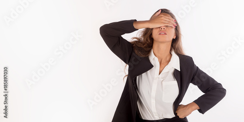 Beautiful business woman with a hand on her eyes. Horizontal wide size banner with copy space.