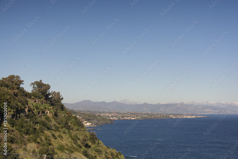 partial view of the Ionian coast near Acireale in Sicily partial view of the Ionian coast near Acireale in Sicily