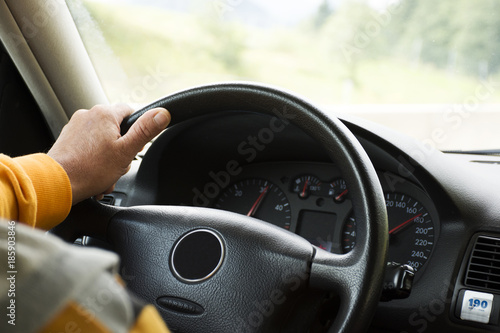 German old man driving car very fast on highway of Stuttgart go to Sandhausen district photo