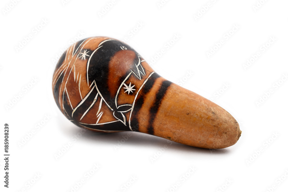 Hand Carved gourd maracas stock images. Musical instrument from Peru. Maracas on a white background. Hand Carved Peruvian Gourd Maracas