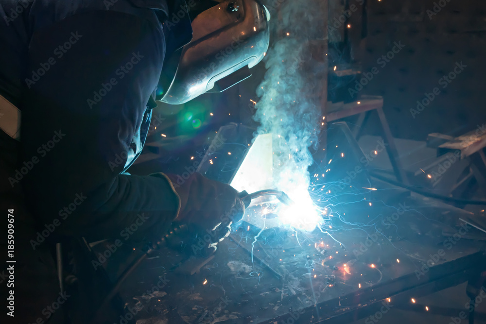 Semi-automatic welding of metal structures in the shop Semi-automatic welding of metal structures in the shop