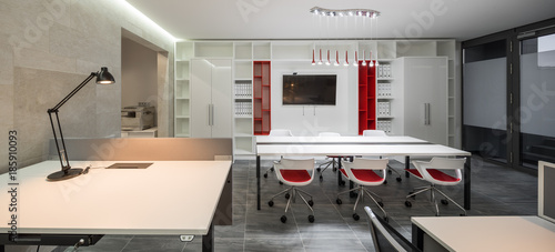 Modern design office in red and white colors. © Aleks Kend