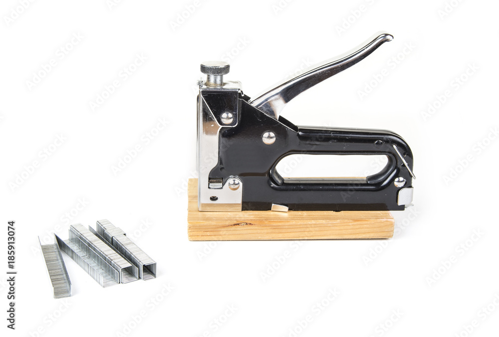 Heavy duty staple gun with staples on the white background Heavy duty staple gun with staples on the white background