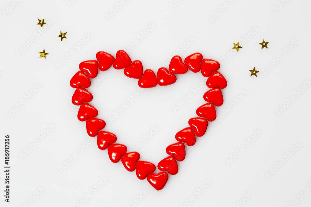 Valentines love concept: Red heart symbolize Love isolated on white background. Top view. Macro, close up. Valentines love concept: Red heart symbolize Love isolated on white background. Top view. Macro, close up.