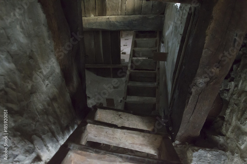 Stairs and underground cellar in old medieval tower