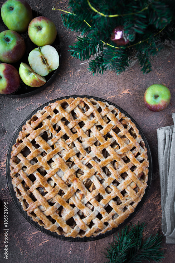 Apple pie with a lattice of whole-grain dough, whole and in pieces