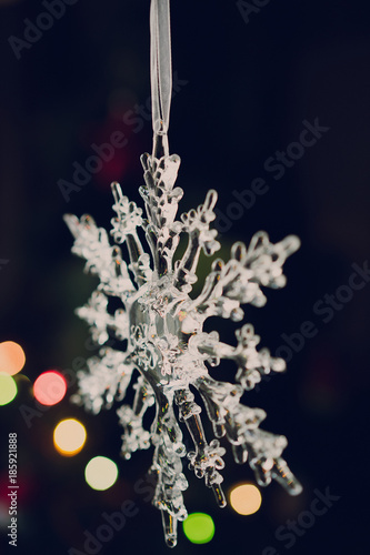 glass snowflake christmas bokeh, dark background