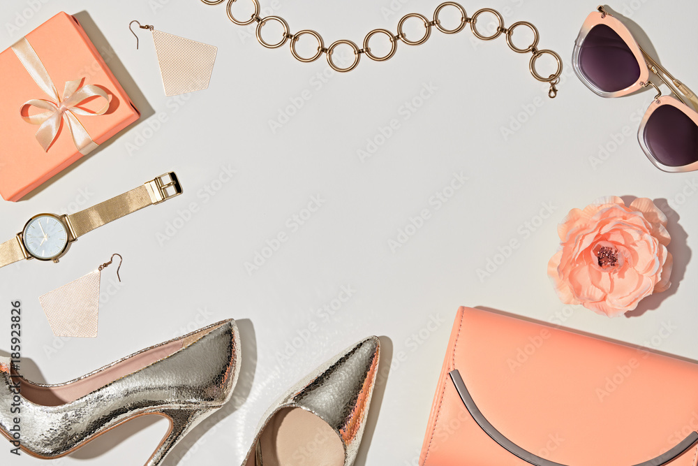 Fashion. Woman Pink Accessories Set. Flat lay. Trendy Rose Gold