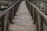 wooden bridge over the protected area of the beach