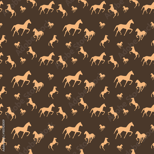 Brown horses seamless pattern. Can be used for textile, website background, book cover, packaging.