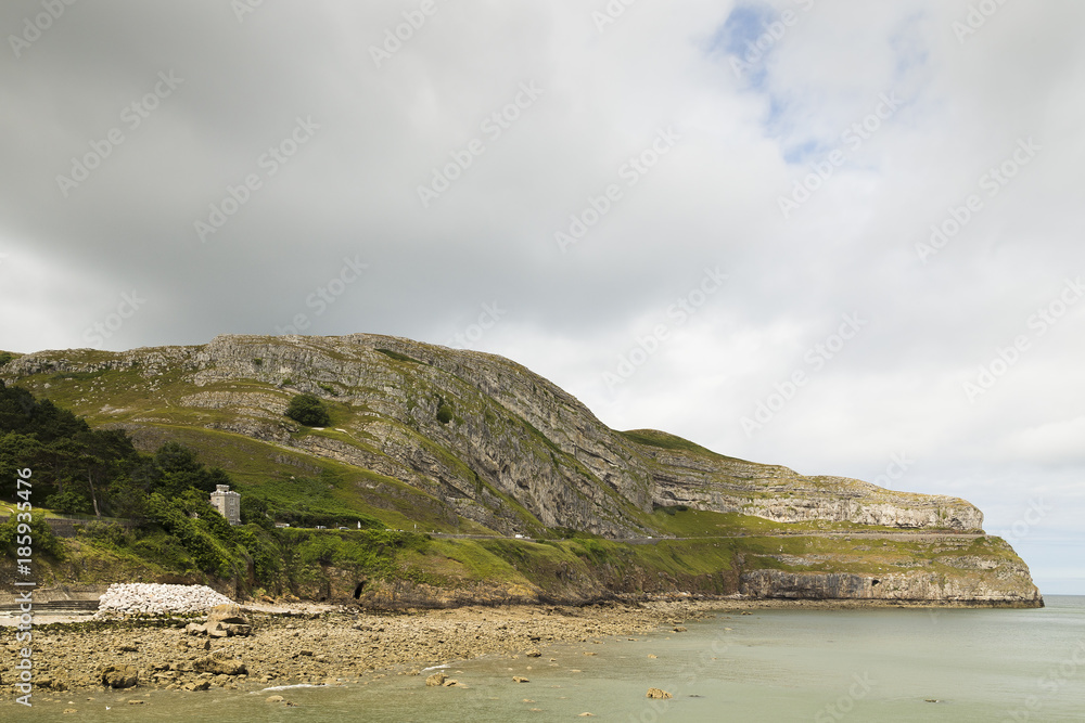 Great Orme / The Great Orme is a prominent limestone headland on the north coast of Wales next to Llandudno, shot from Llandudno pier, Conwy, North Wales,UK.